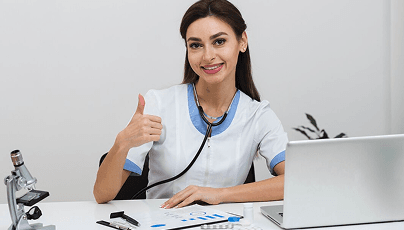 Healthcare professional giving thumbs up